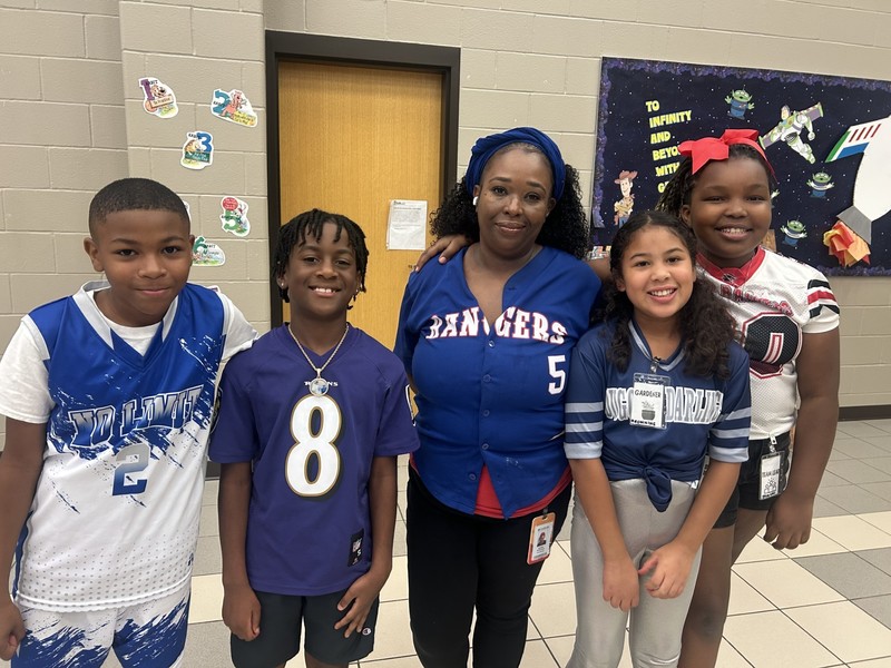 teachers wearing jerseys for national attendance awareness week