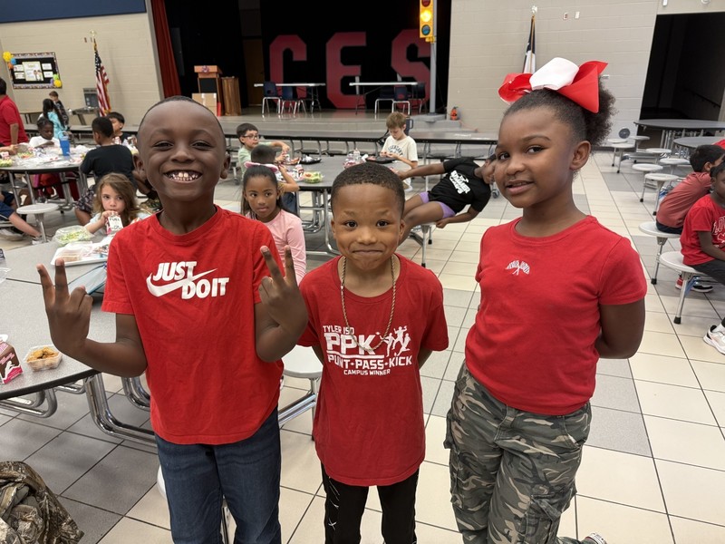 students wearing red, white, and black for national attendance awareness week