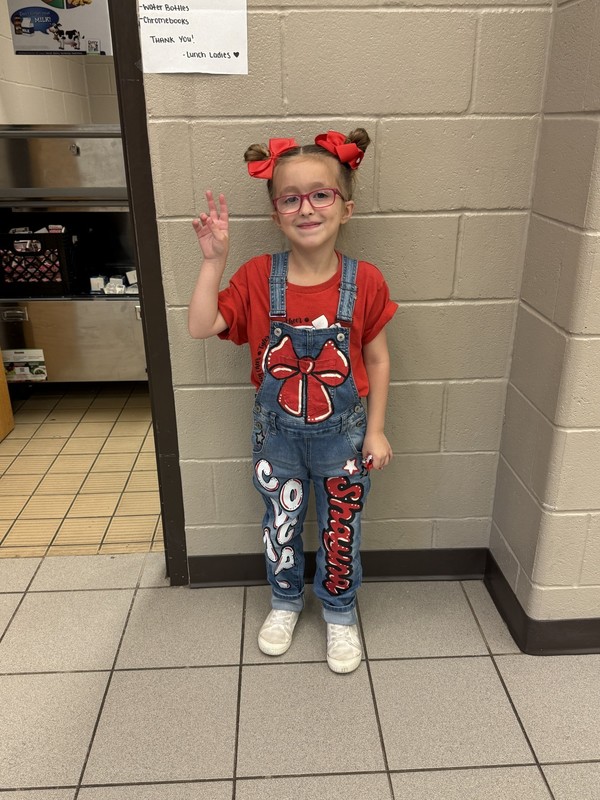 students wearing red, white, and black for national attendance awareness week