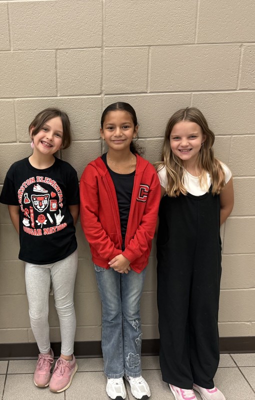 students wearing red, white, and black for national attendance awareness week