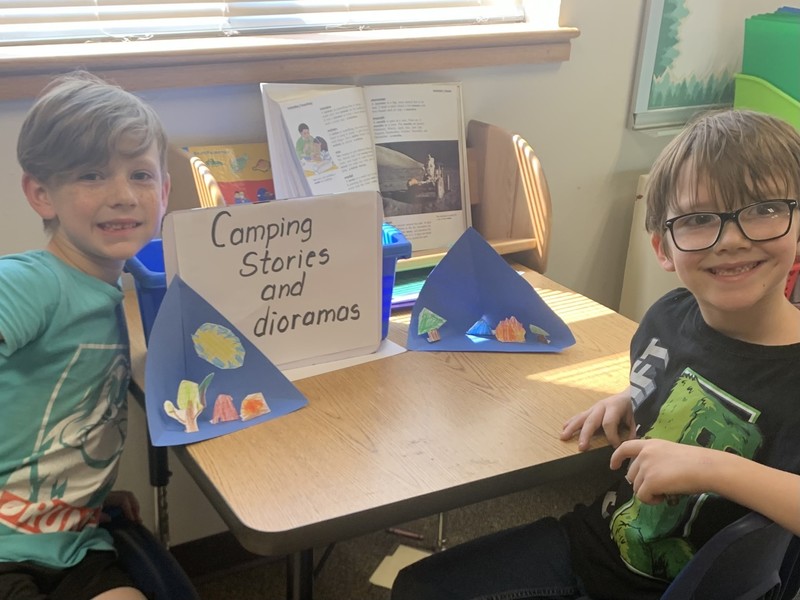 students making camping dioramas