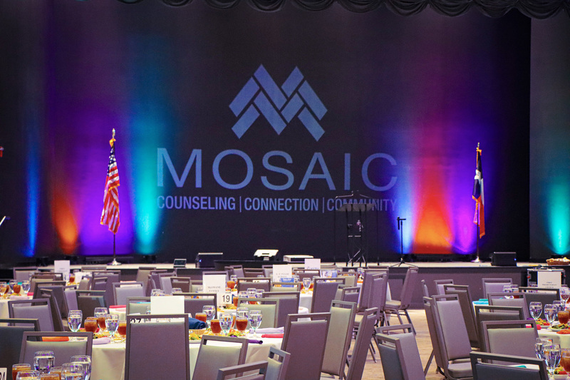 tables and chairs set up in banquet hall