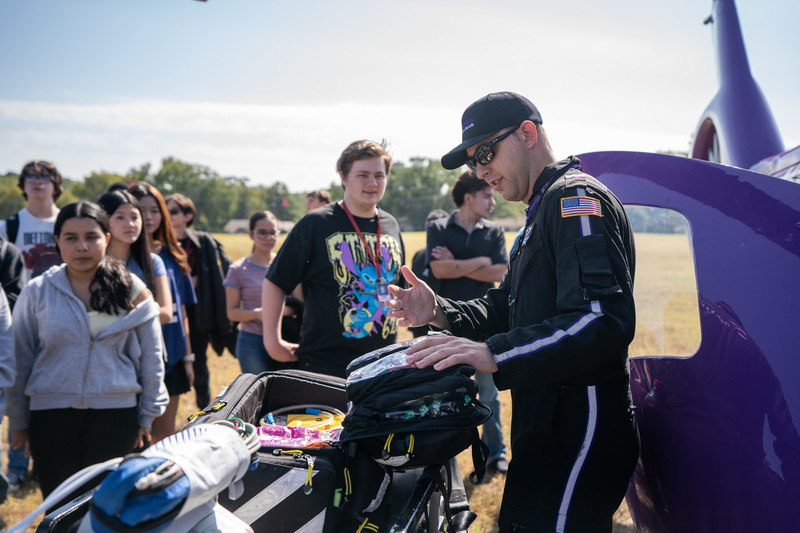 high school students talking to lifeflight paramedic