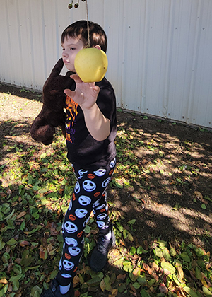 students exploring farm produce