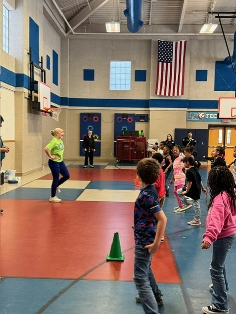 students learning martials arts in PE class