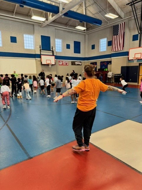 students learning martials arts in PE class