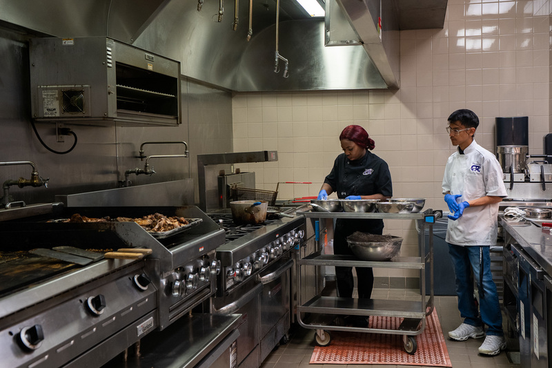 teens working in kitchen