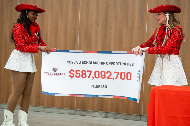 Tyler Legacy Drill unveils the 2025 VU Scholarship Opportunities banner, revealing Legacy earned $587,092,700 in potential scholarships for Legacy seniors.