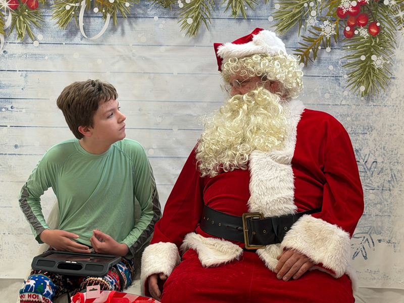 boy looking at Santa