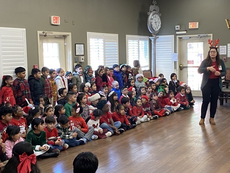 elementary age kids in Christmas outfits