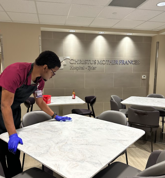 teen boy washing table