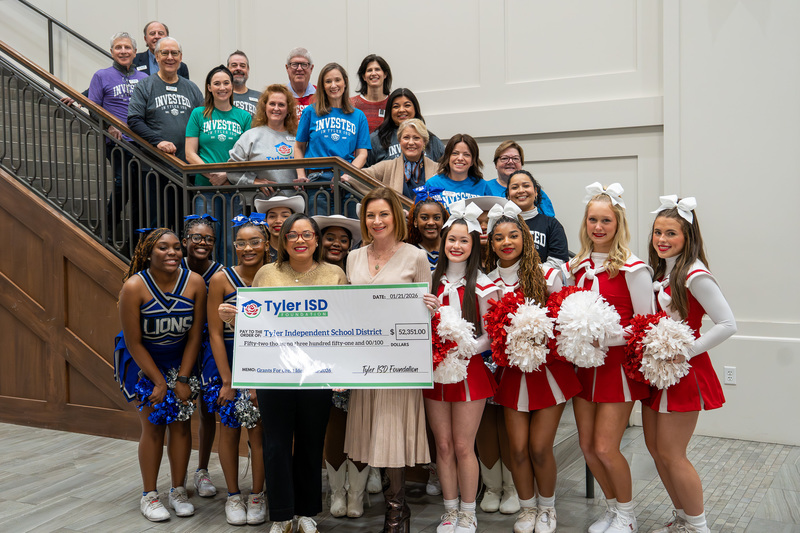 cheerleaders, men and women standing on staircase