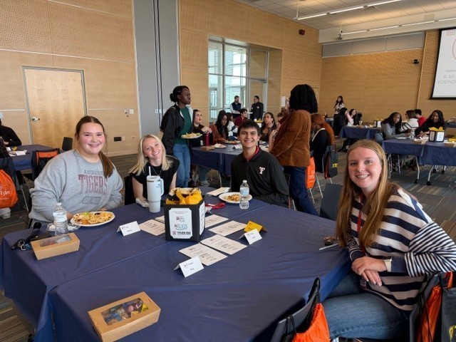 teens sitting at tables