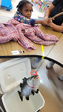 Students were then introduced to gyotaku, a traditional Japanese fish-printing technique