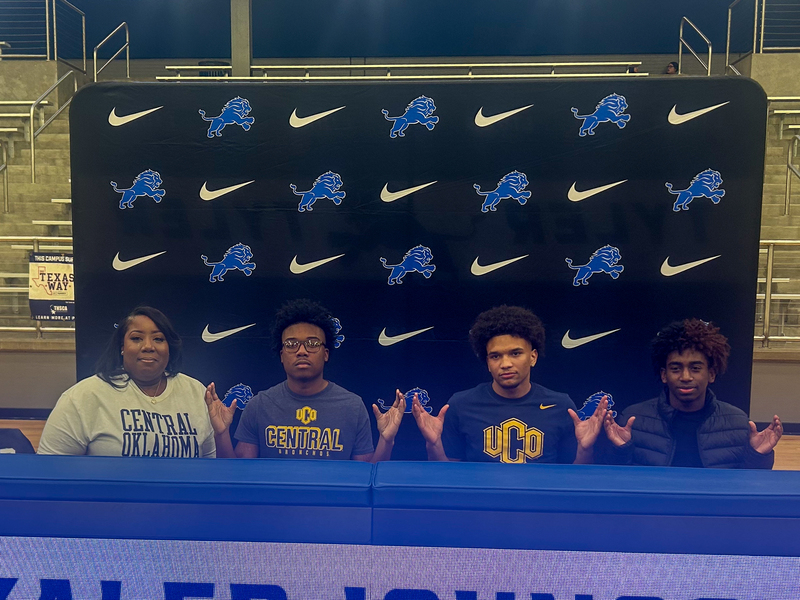 Tyler High student-athlete smiles with family and signs with Central University of Oklahoma to play at the collegiate level