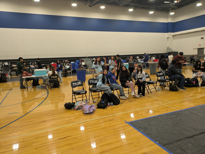 teens in gym hosting blood drive
