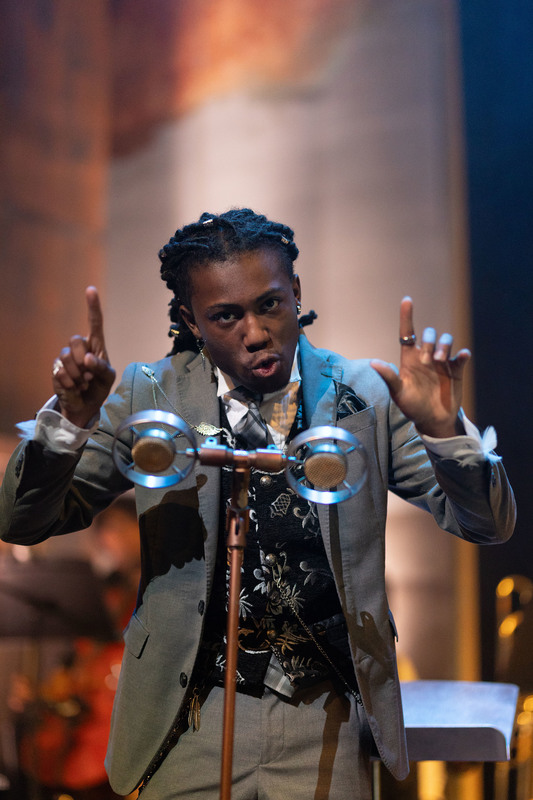 teen boy performing on stage