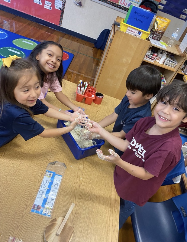 kids making tortillas
