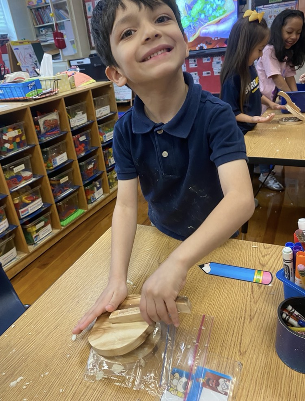 boy making tortilla