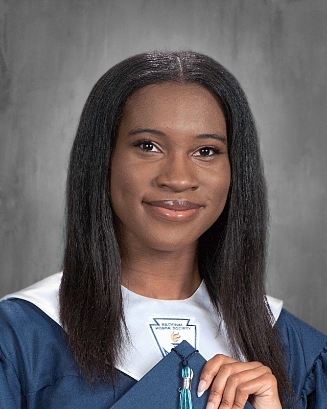 teen girl with graduation gown and white stole