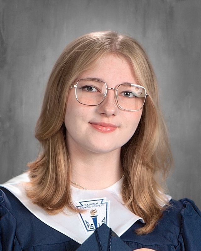 teen girl in graduation gown with white stole