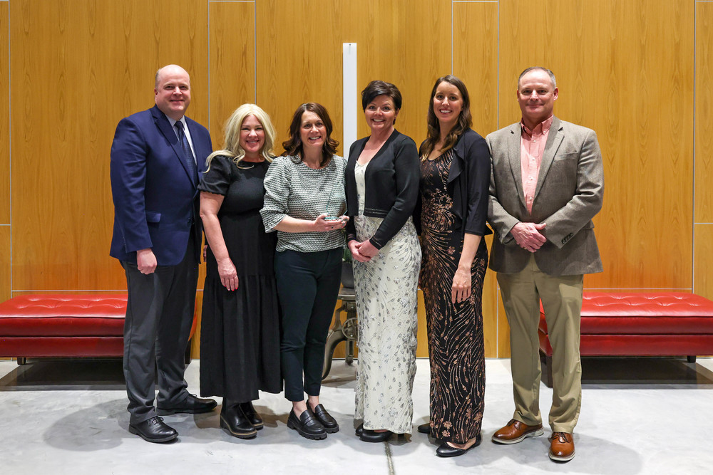 Uintah School District Business Administrator D. Troy Timothy, Uintah High Vice Principal Stephanie Bills, UHS Principal Amanda Brown, UHS Teen Center coordinators Karen Laub and Janet Mitchell, and USD Superintendent Dr. Rick Woodford are pictured after the Teen Center received the Business of the Year award in the Government, Education and Community Leadership category at the Vernal Area Chamber of Commerce’s 77th Annual Gala and Business Awards held at the Uintah Conference Center on Feb. 26, 2026. 