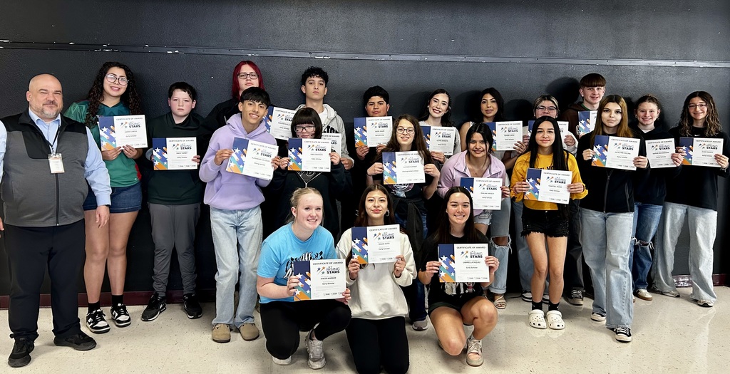 A group photo of students earning recognitiion for their PreACT scores