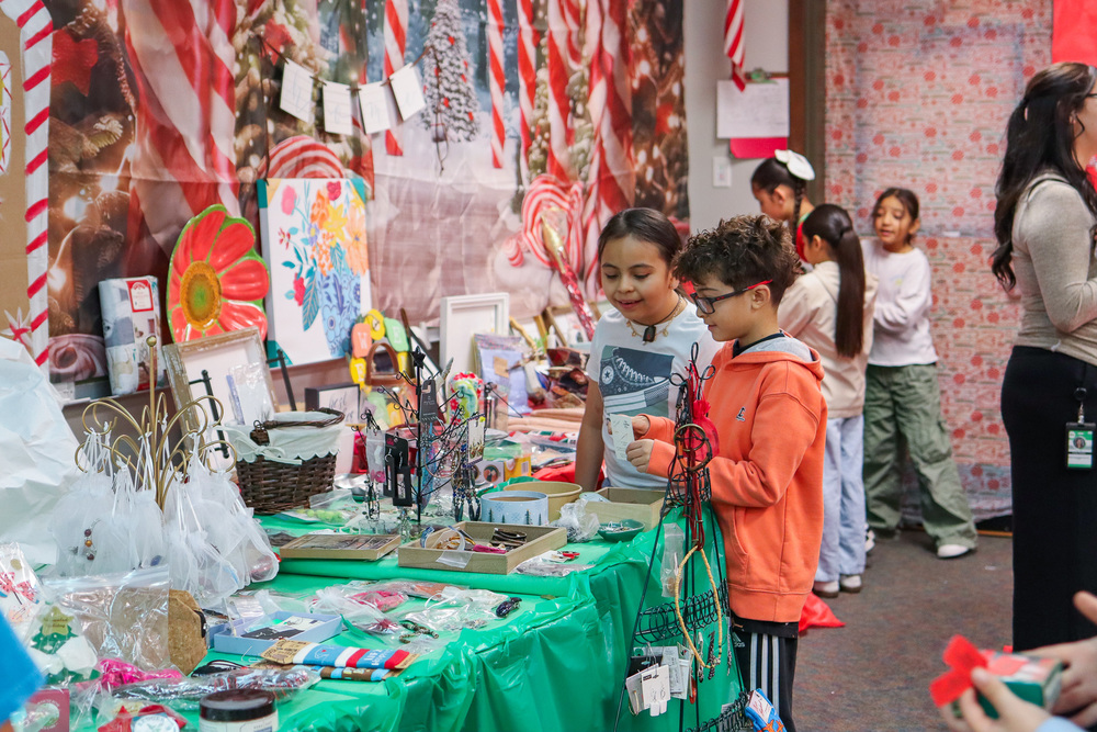 students shopping at the Little Angel Shop