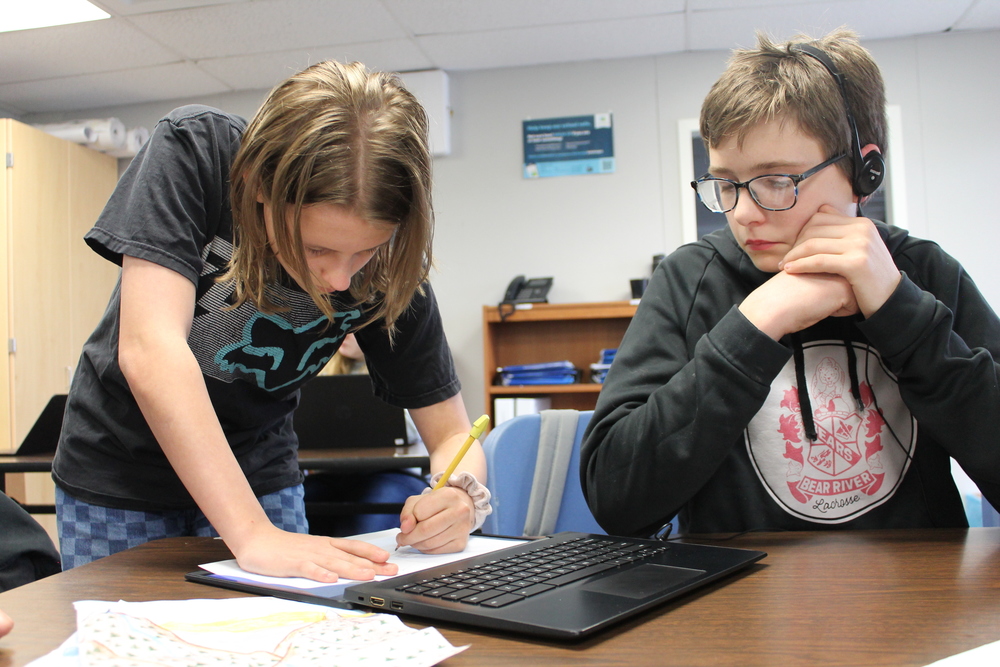Students repair a robot