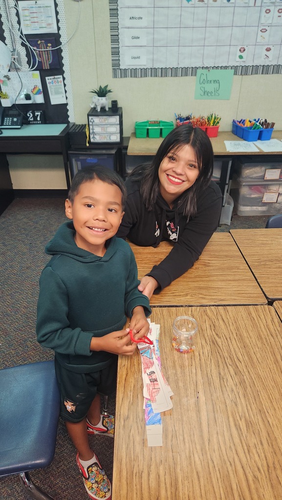 Student with their family member enjoying Bring a Grown up Day