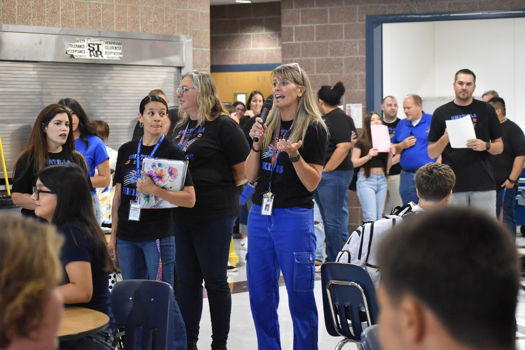 Teachers speaking at freshman orientation