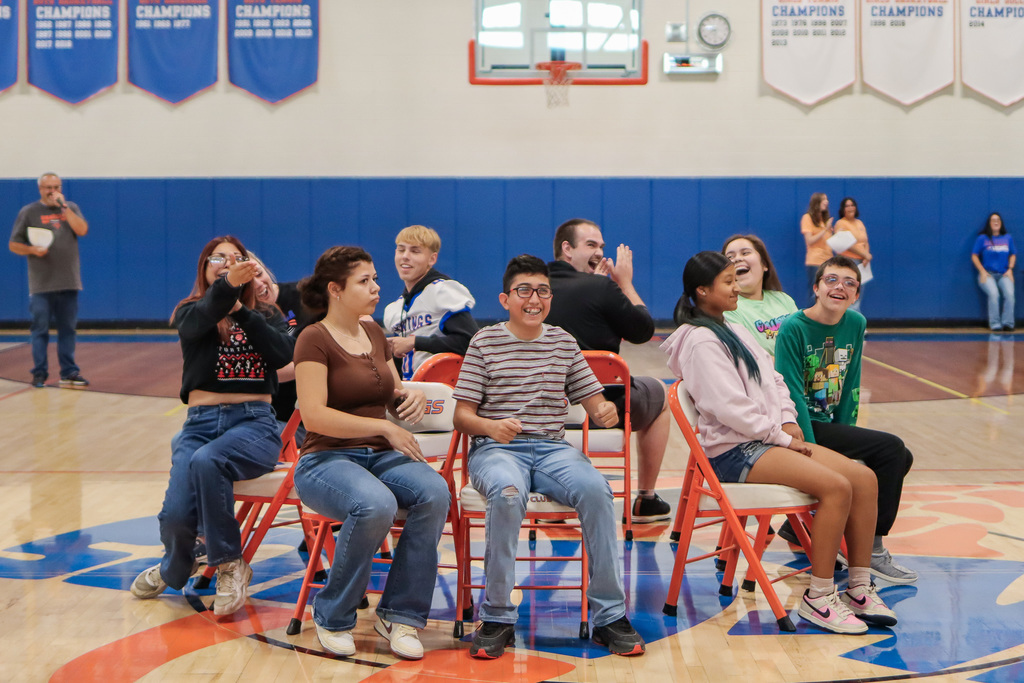 students playing musical chairs