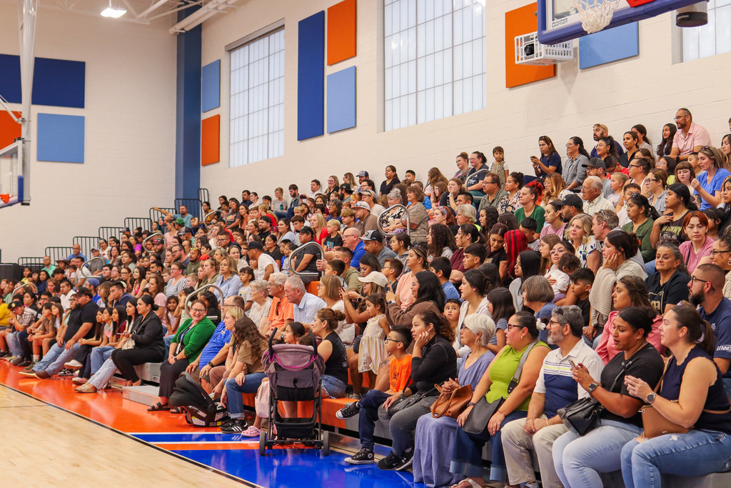 students and families filling the bleachers up at the CVI ceremony