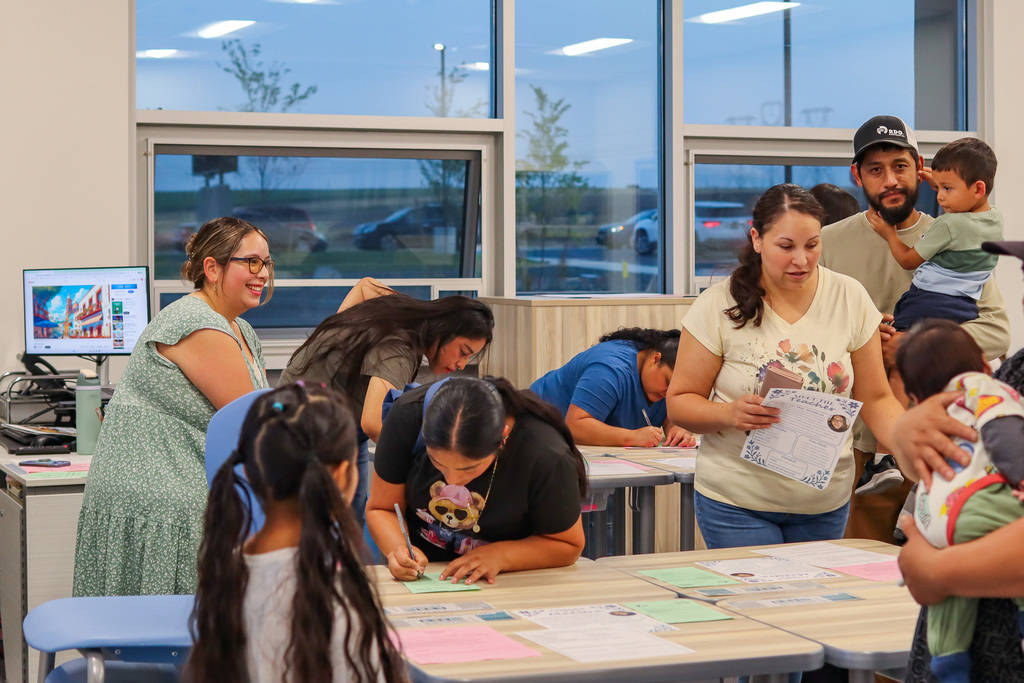 Students and families visiting teachers classrooms