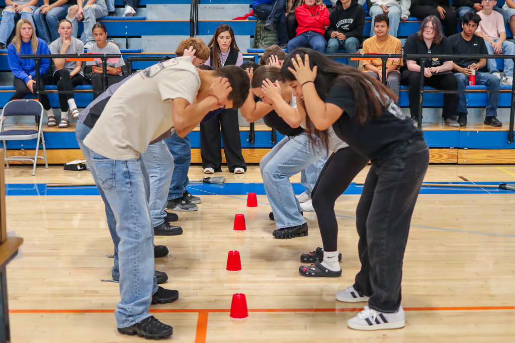 students playing assembly game