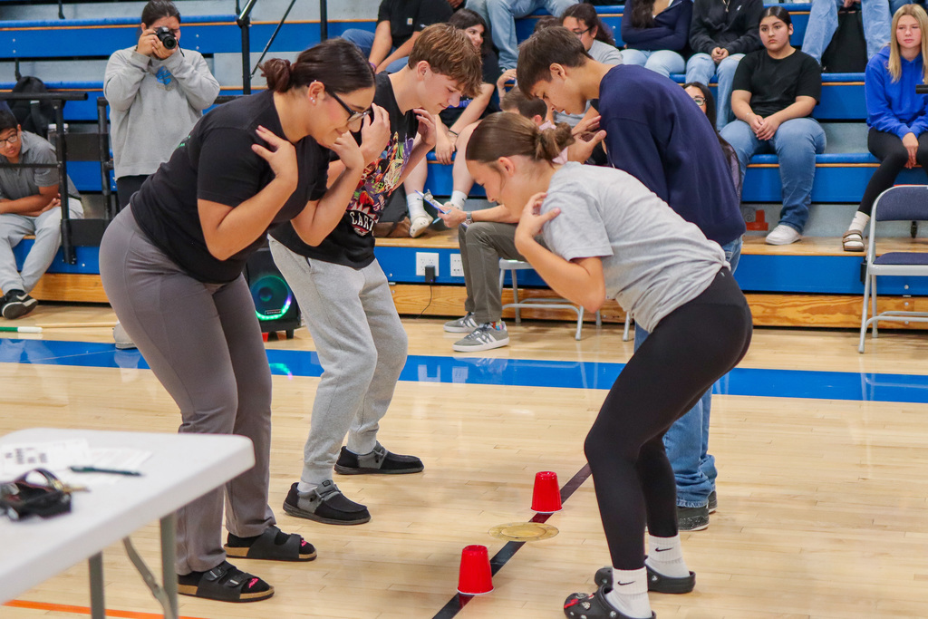 students playing assembly game