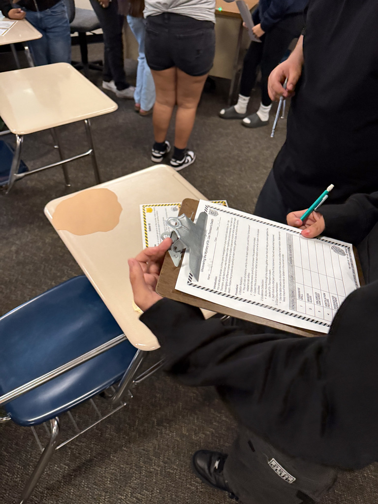 student filling out lab form