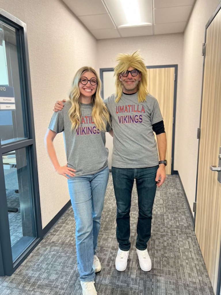 Photo of Mr. Young and Mrs. Church dressed as twins