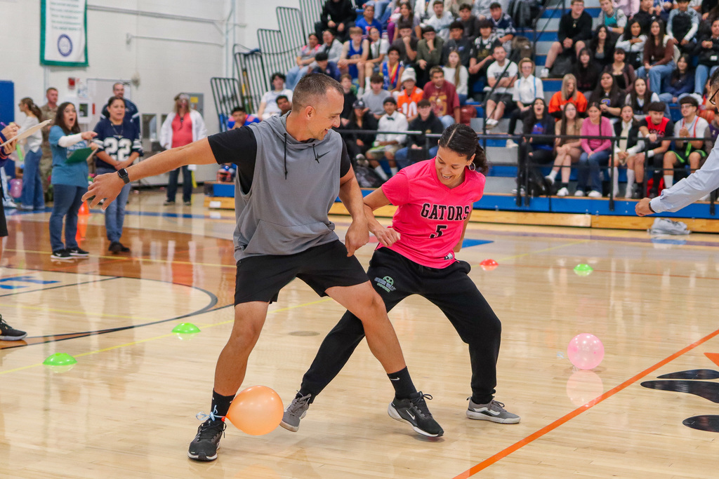 photo of teachers participating in assembly game