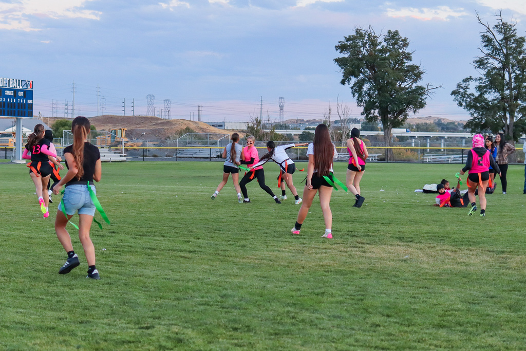 students playing powder puff football