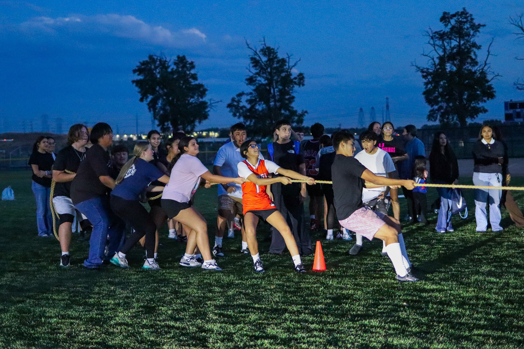 students playing powder puff football
