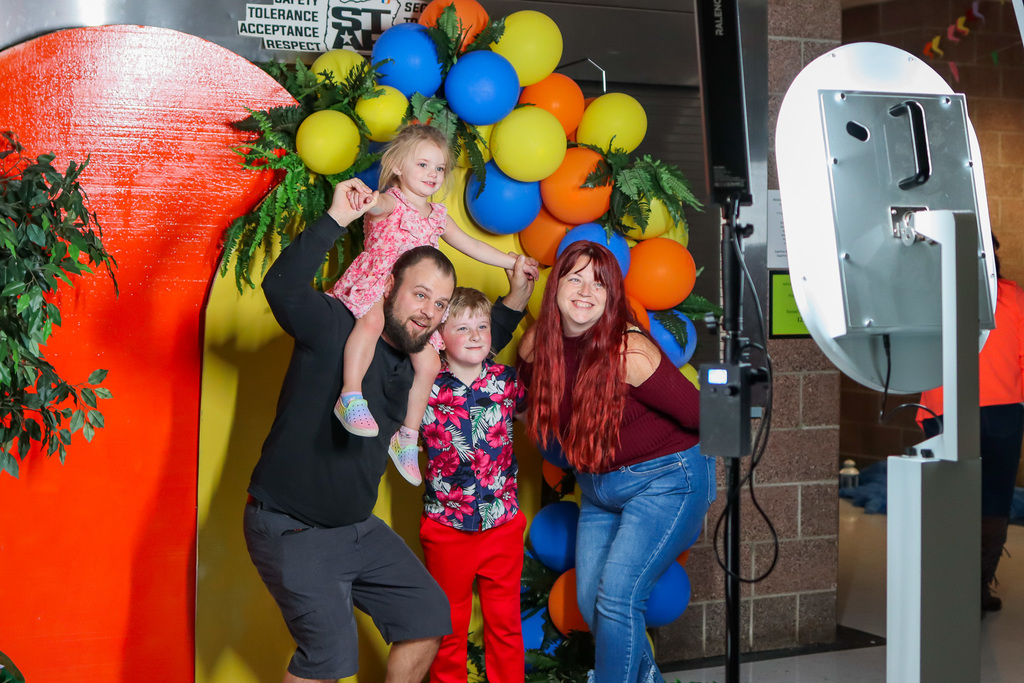 family taking a photo