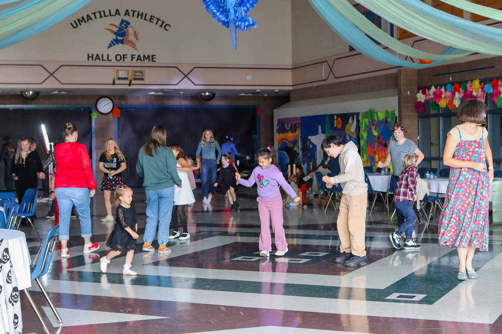 families dancing on the dance floor