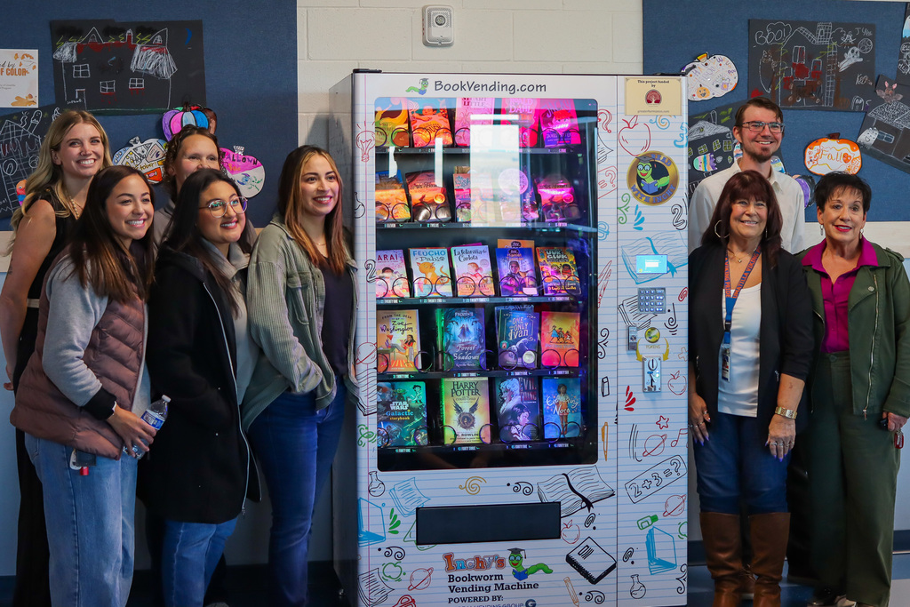 Photo of Parent Club Members, School board member Josiah Barron, Vice principal Kara Church, and member from the Greater Hermiston Community Foundation with the machine.