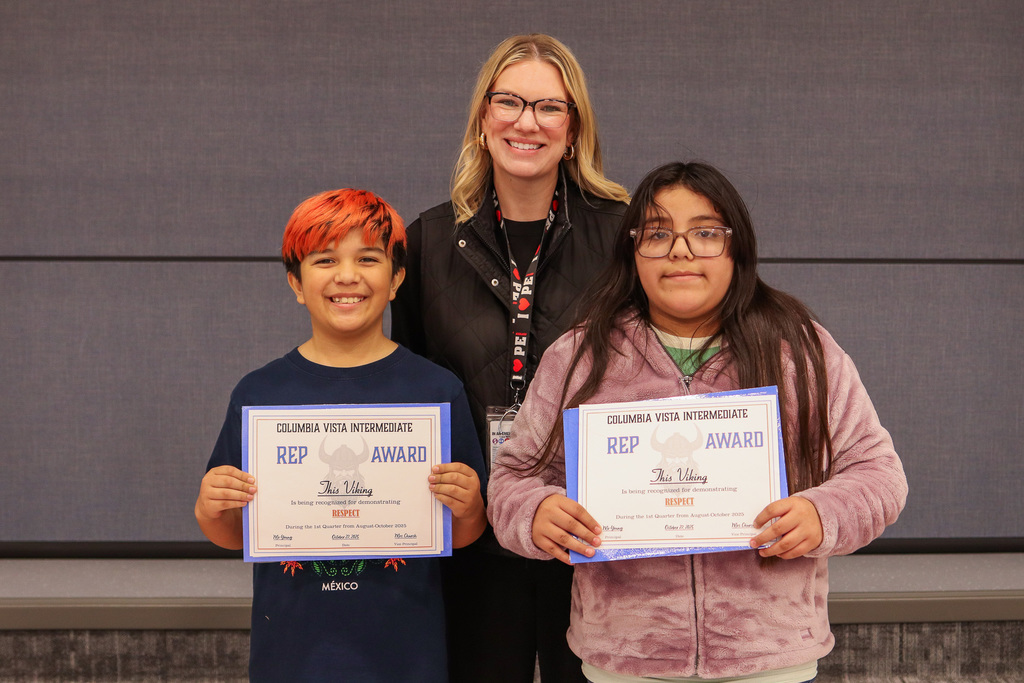 Mrs. Hernandez pictured with her REP Award Winners