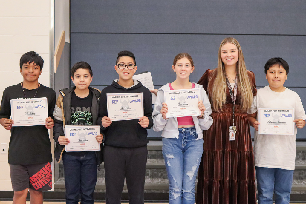 Mrs. Trevino pictured with her REP Award Winners