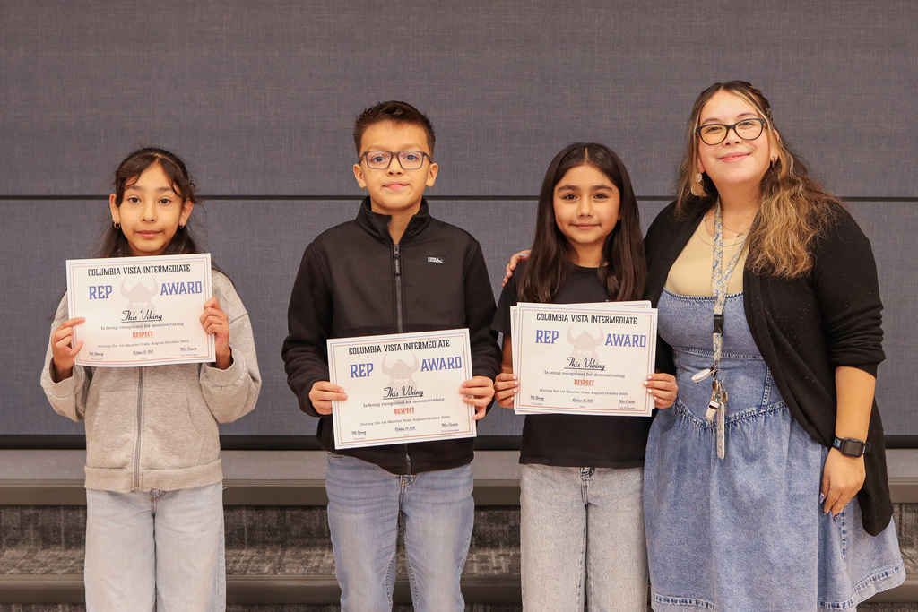 Ms. Mendoza pictured with her REP Award Winners