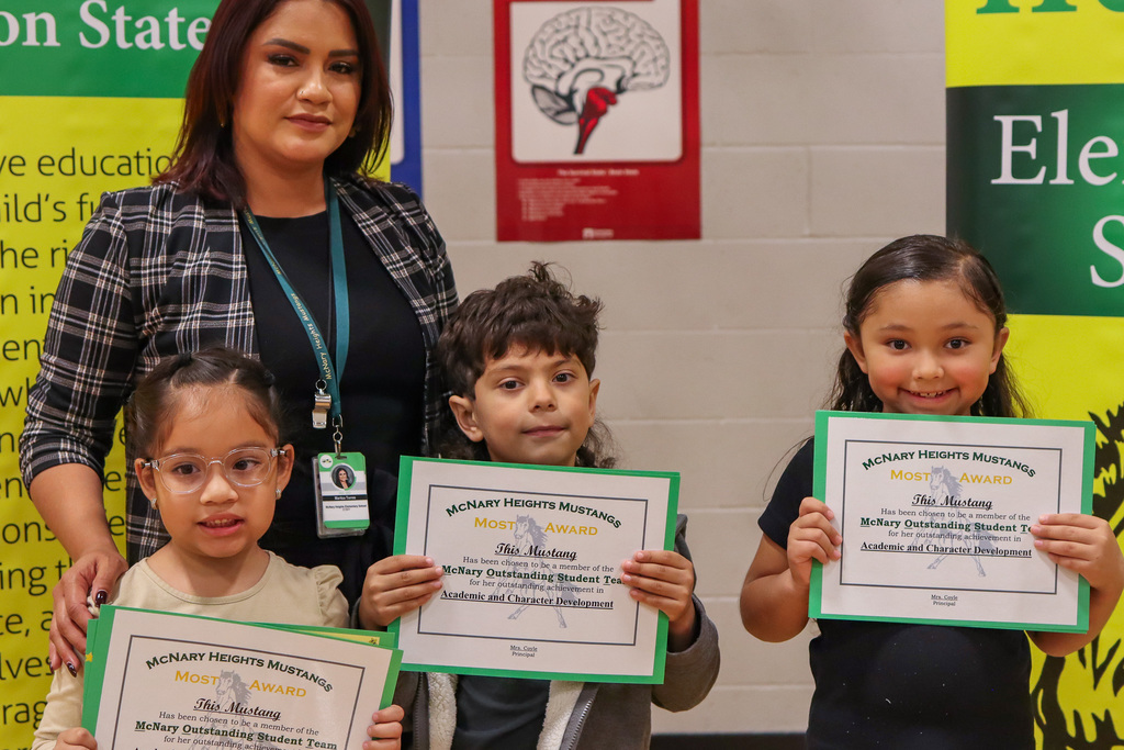Photo of teacher with MOST Award Winners
