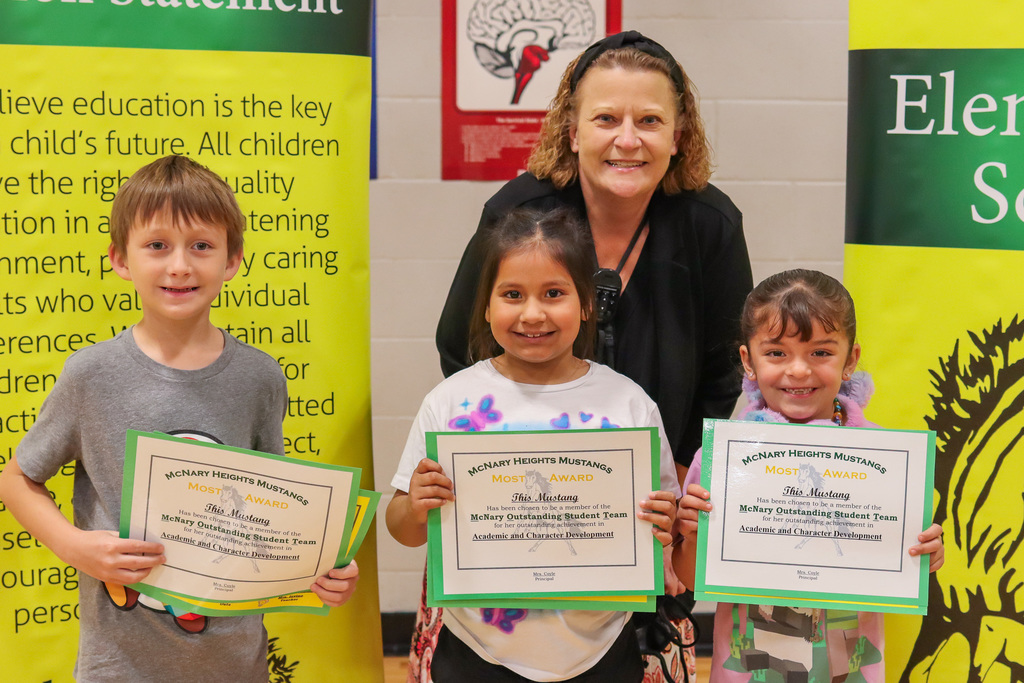 Photo of teacher with MOST Award Winners