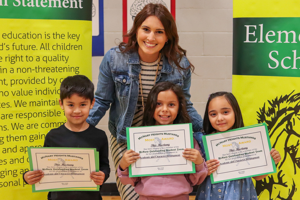 Photo of teacher with MOST Award Winners
